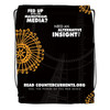 A black drawstring backpack with an intricate orange design and branding, featuring bold text about alternative media.