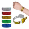A selection of holographic wristbands in various colours: red, green, blue, yellow, and silver, displayed on a wrist and separately.