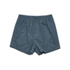 Grey boxer shorts featuring a loose fit and an elasticised waistband, with a small branding logo.