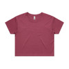 A maroon cropped tee shirt with a relaxed fit and short sleeves. It features a logo on the neckline.
