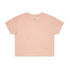 A cropped tee in a soft peach colour with a relaxed fit and short sleeves. It features a branding label.
