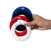 A hand holding three silicon wrist discs in red, black, blue, and white, featuring a logo.