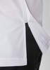 A close-up view of a white and black jacket, featuring a zip and side seam detail. The jacket has a logo.