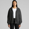 A faded black zip hoodie with a grey lining and front pockets. The model is wearing it with a white t-shirt and black jeans.