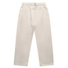 Relaxed cuffless track pants in a light beige colour with an elastic waistband and two side pockets.