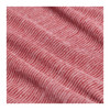A textured, red eco-knit fabric featuring a subtle wave pattern, ideal for a performance half zip jumper.