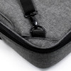 A grey laptop bag with a zipper, featuring a clip and fabric texture. It has a logo on the surface.