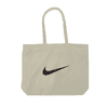 A cream tote bag with a black logo, featuring two handles for easy carrying.