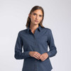 A women's button-up shirt in navy blue with a classic collar and button detailing. It features a logo.