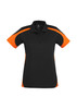 A women's short sleeve polo shirt in black with orange accents and a logo.