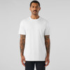 A white basic tee displayed on a model with tattoos, featuring a simple design and relaxed fit.