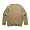 A beige sweater with a rounded neckline and long sleeves. The sweater has a logo on it.