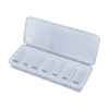 A clear plastic pill box with compartments for each day of the week, featuring a flip-top lid and a simple design.