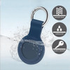 A blue silicone Airtag case with a keyring, featuring a waterproof design and scratch-resistant surface.