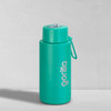 A drink bottle in a bright teal colour with a logo and a lid featuring a spout and carrying strap.