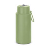 A drink bottle in a soft green colour with a secure lid and built-in handle. Features a logo on the side.