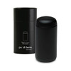 A black drink bottle in a matching black cylindrical container, featuring a logo on the side.