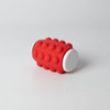 A red spinner with a textured surface and white ends, featuring rounded bumps. It has a logo on one side.