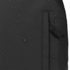 A black backpack with a textured surface featuring water droplets and a side pocket. It has a branding logo.