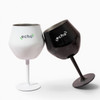 Two wine glasses, one white and one black, featuring a logo, with a detachable stem and bowl design.