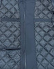 A unisex quilted waterproof jacket in dark grey, featuring a front zipper and multiple pockets. The fabric has a diamond pattern.