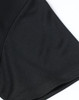 A close-up of a black ladies' polo shirt with a jacquard knit texture and a visible logo.