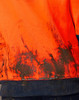 A Hi-Vis two-tone water-resistant fleece hoodie in orange, featuring a soiled fabric texture and a navy blue hem.