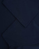 A navy blue premium cotton short-sleeve T-shirt with neatly folded sleeves. It features a logo on the fabric.