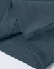 A close-up of a ladies' premium cotton short sleeve tee shirt in a muted blue-grey colour with visible stitching details.