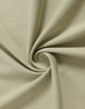 A close-up view of light beige fabric, showcasing its soft texture and smooth finish, suitable for a premium tee shirt.