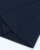 A navy blue premium cotton short-sleeve tee shirt with neatly finished seams. It features a logo.