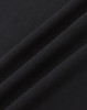 A close-up of a black premium cotton fabric, showcasing its smooth texture and soft feel.