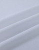 A close-up view of white cotton fabric, showcasing its smooth texture and soft folds.