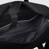A black duffle bag with a patterned interior and inner pocket, featuring a simple design and a logo.