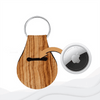 A wooden-textured neoprene keychain with a slot for an AirTag and a metal keyring.