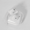White noise cancellation earbuds in a clear case, featuring a simple design and a compact size.