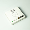 A white box containing the SeekTag Dual System Item Tracker, featuring a circular item tracker inside.