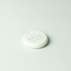 A white circular tracker with a branding logo, featuring a flat design on a light background.
