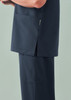 A navy unisex V-neck scrub top featuring side slits and pockets. The material appears smooth and durable.