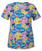A colourful scrub top featuring a playful pattern of various smiley faces in pink, blue, and yellow. Includes a logo.