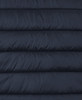 A dark navy puffer vest featuring quilted sections and a logo. The fabric has a smooth finish.