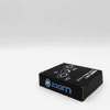 A black box for a product with a logo, featuring an illustration of a wireless charging device.