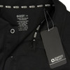 A black unisex polo shirt with care instructions and a tag, featuring a logo.
