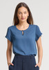 A blue short sleeve blouse with a keyhole detail at the neckline, featuring rolled cuffs.