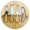 A round bamboo cheese board set featuring four stainless steel knives with wooden handles and a corkscrew.