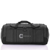 A grey duffle bag with black accents and a logo, featuring multiple zippered compartments and sturdy handles.