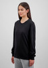 A women's long sleeve tee in black, featuring a round neck and long sleeves, displayed on a model.