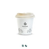 A white compostable paper coffee cup with a tan lid and minimal branding, featuring various food icons.