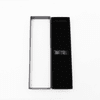 A black gift box designed for holding a pen, featuring a sleek and minimalist design.