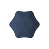 A navy BLUNT Metro Umbrella with a unique octagonal shape and a central button, featuring a logo.